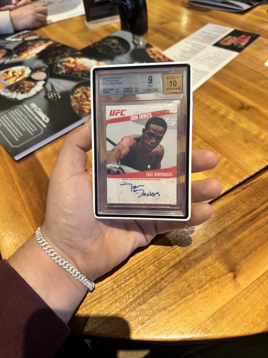 NFear's tweet image. Bought this UFC grail yesterday at the Chicago Sports Spectacular, this is never going to leave the personal collection. UFC UNDEFEATED GOAT @JonnyBones #1 #p4p