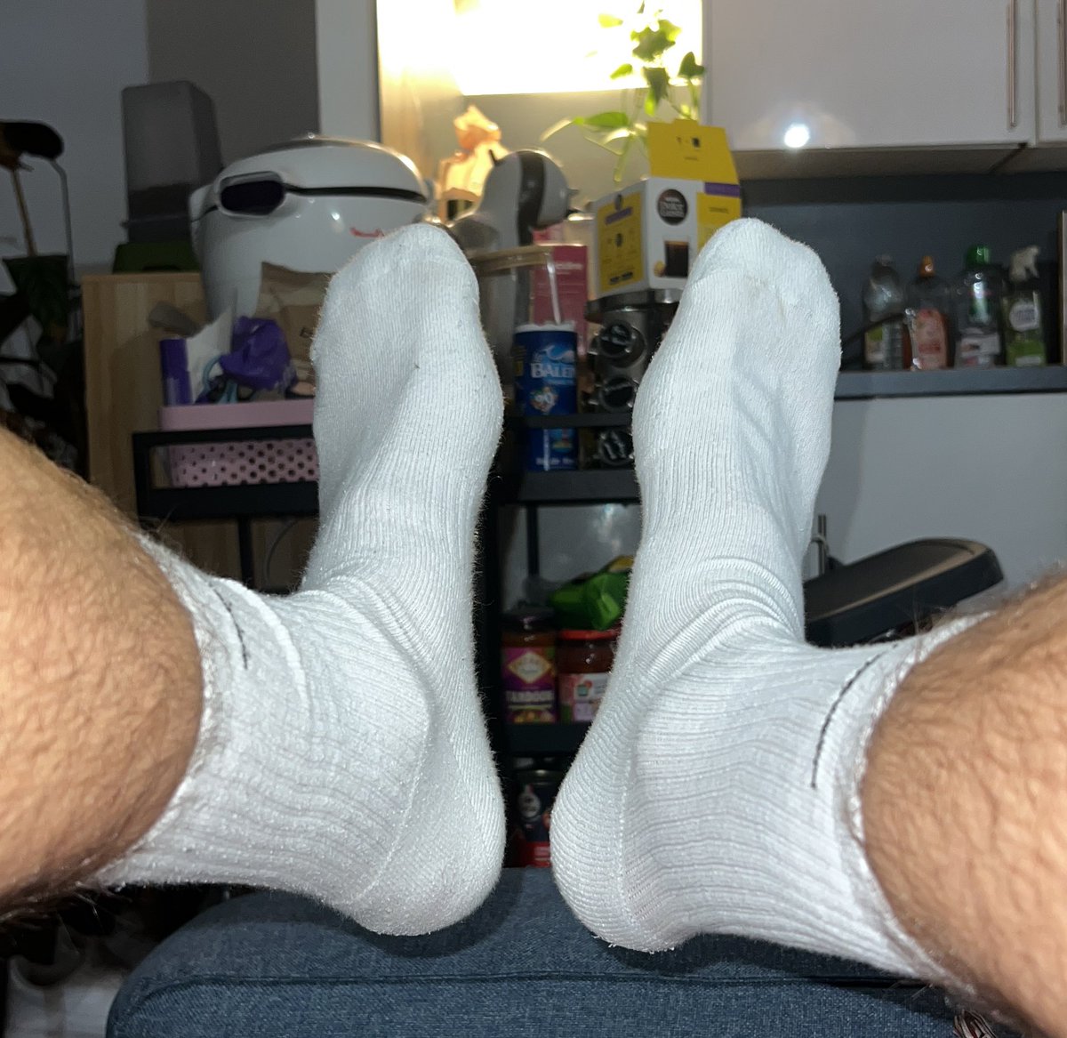 Come take them off and clean my feet with your tongue