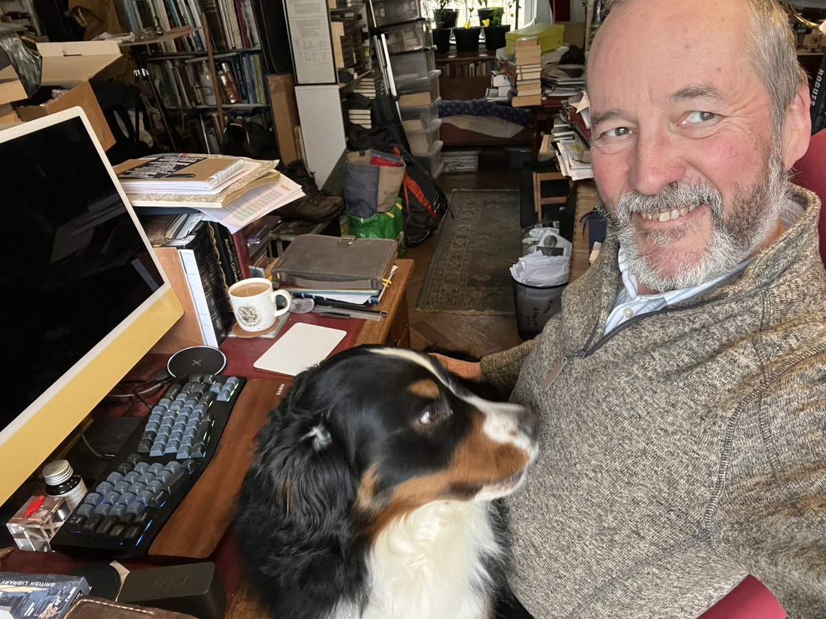 MichaelJecks's tweet photo. This is for all those who complain it is a little difficult to type with a cat on the lap. Try typing with a #bernesemountaindog who needs a hug! #work #author #amwriting #histfic #lapdog #workcolleagues https://t.co/5jQN14NeQa