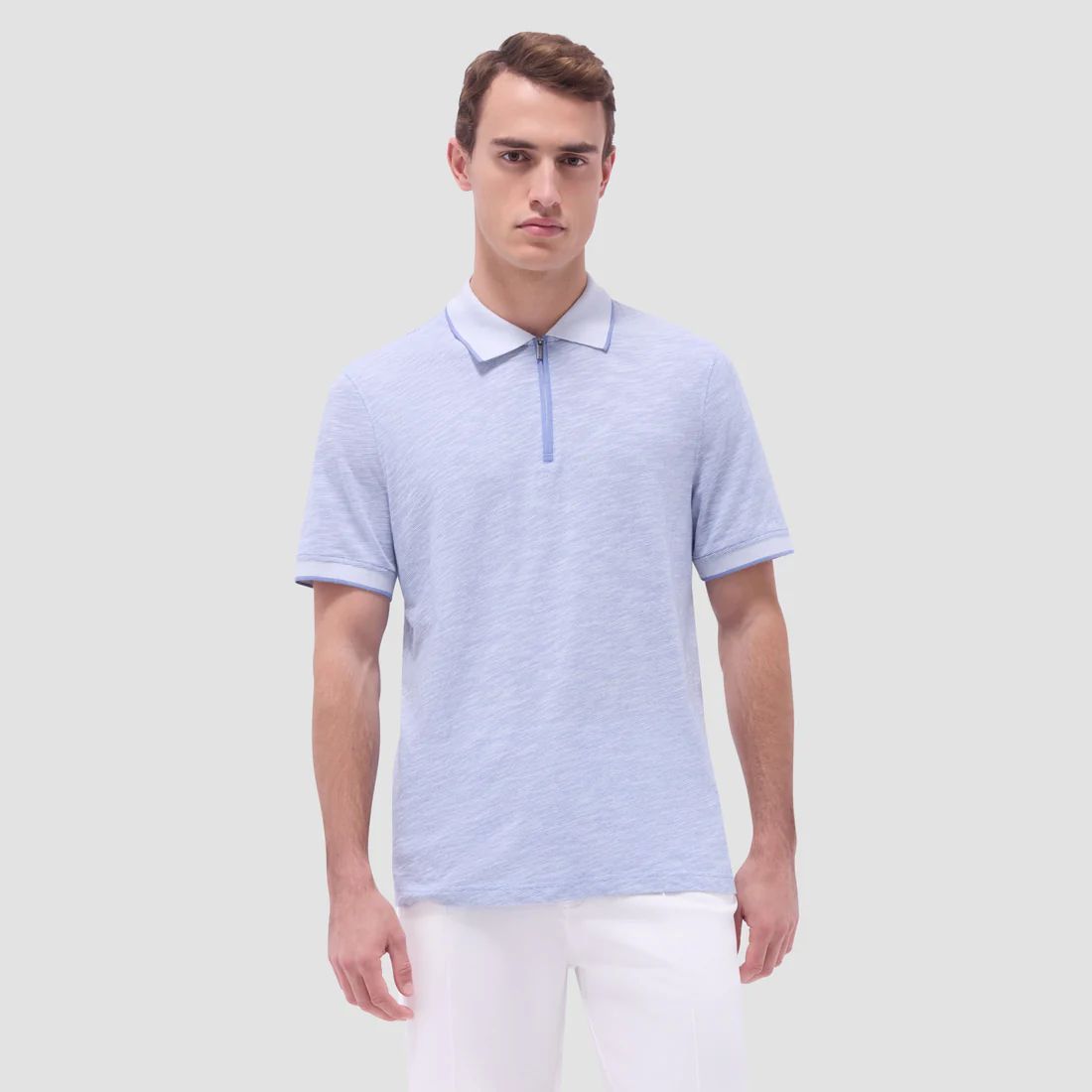 Casual meets sophisticated in Bugatchi’s new polo. Designed with a cotton-linen blend for natural softness and finished with minimal stripe detailing, this is the go-to piece for effortless style. Shop the latest arrivals in-store and online at davidewhite.com