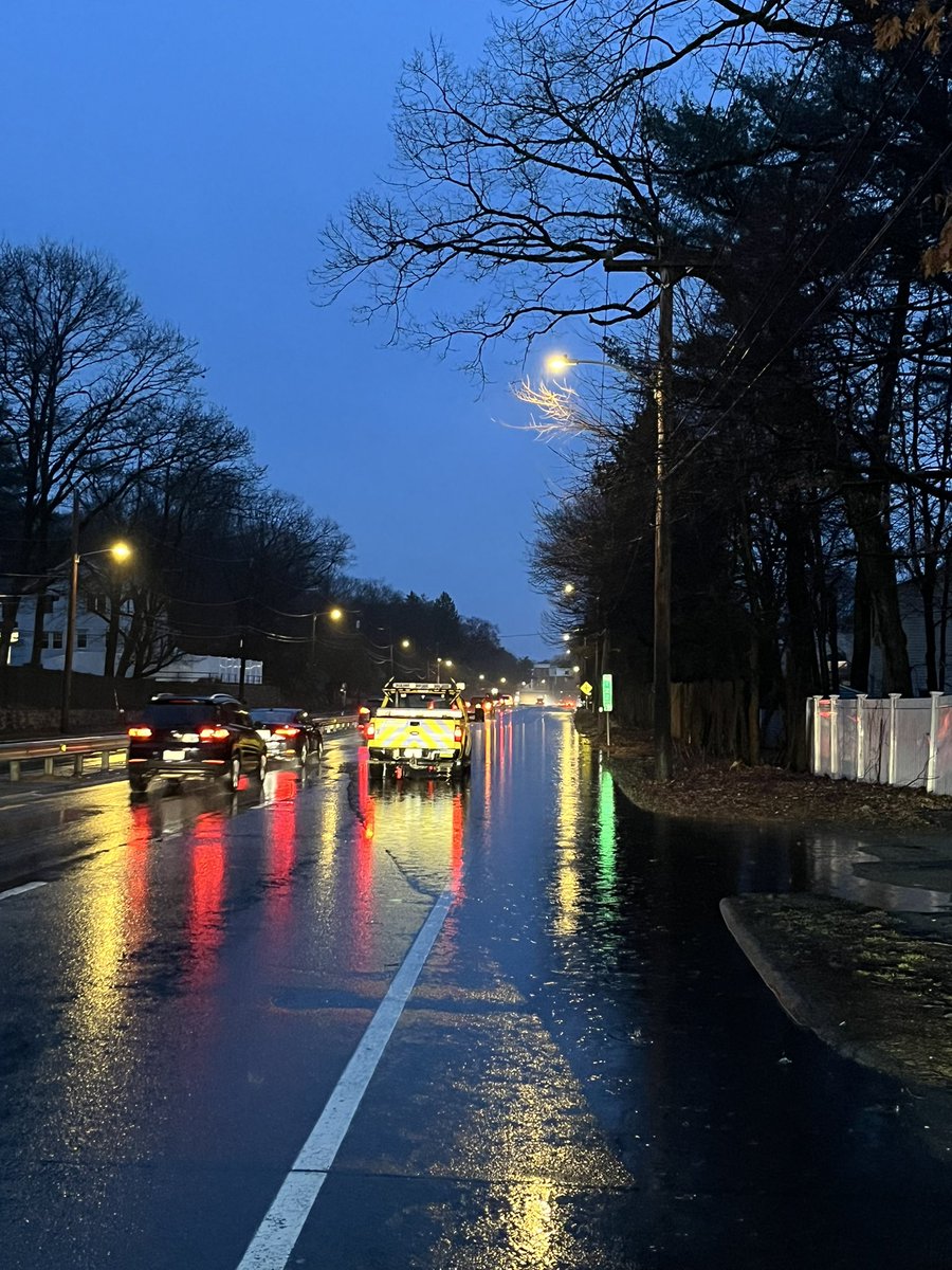 WellesleyPolice's tweet photo. Traffic Advisory: Expect delays on Rt. 9 east between Weston Rd. and Oak St. / right lane closed due to flooding. @MassDOT on scene, working to clear the storm drains. https://t.co/jrpbcgJmEF