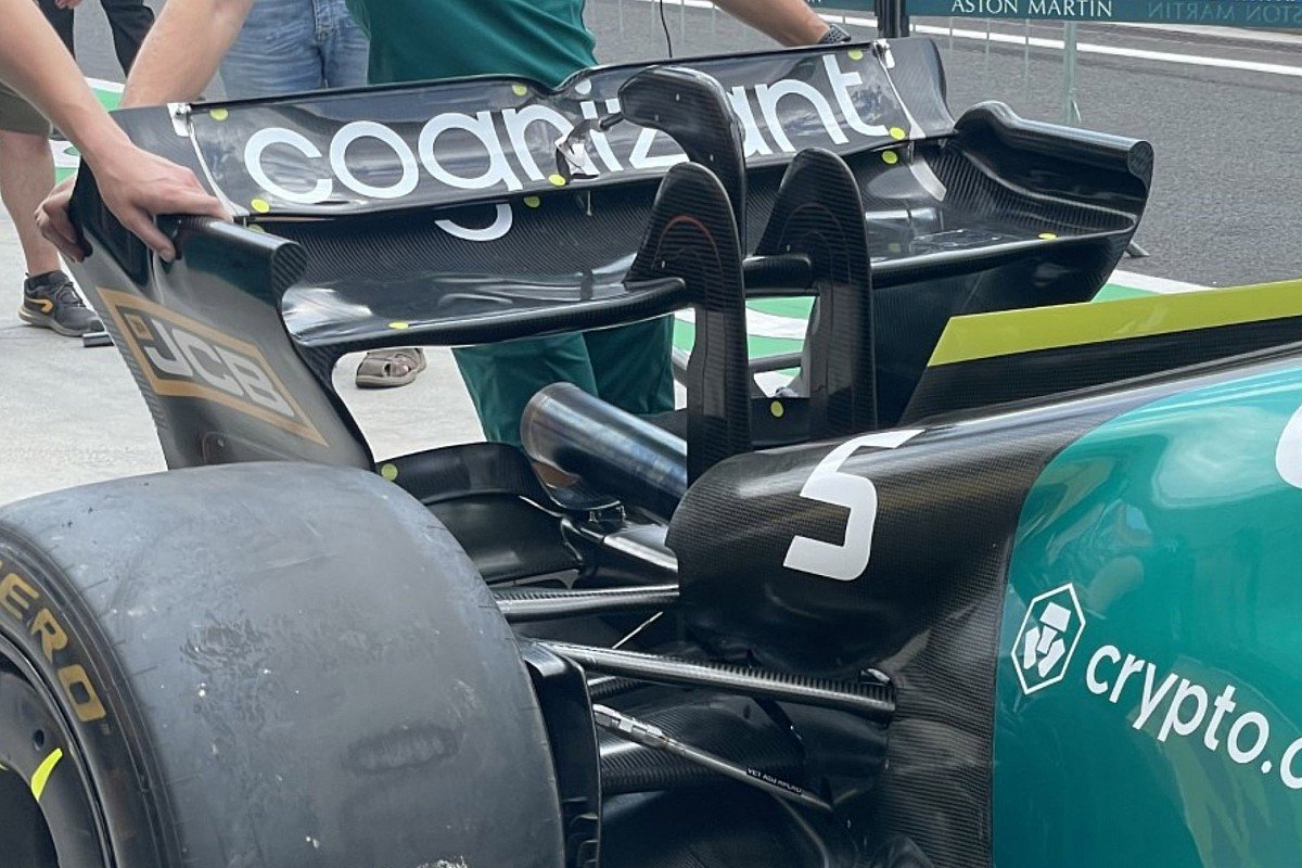 WHY THE REAR WING GAP CHANGE? 

It's not because of McLaren's dominance (both Ferrari and Sauber use the same philosophy of max gap);

It's because the gap was never intended as the aero part but was there for the DRS activation system, thus using the gap for aerodynamic effect