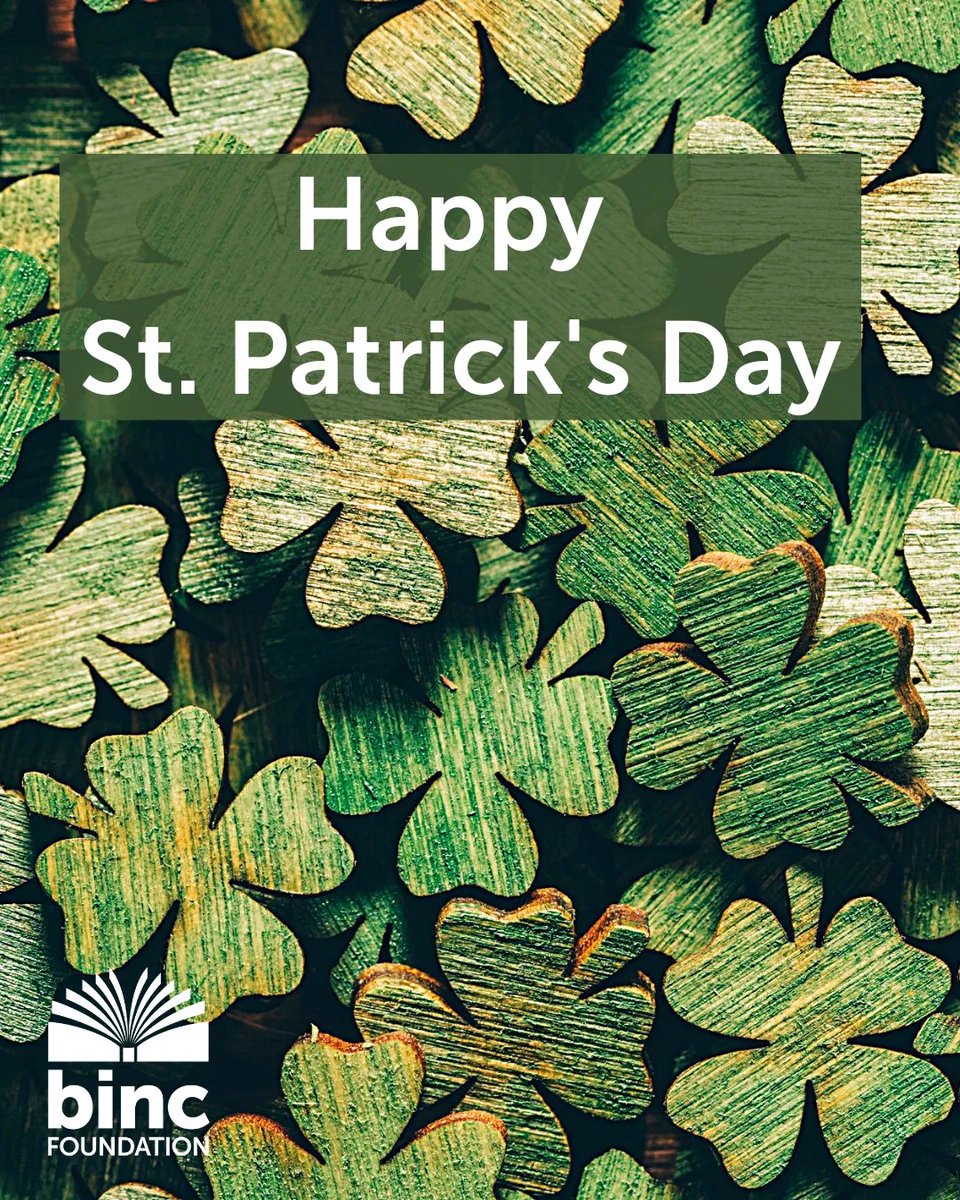Background is green painted wooden clover, "Happy St. Patrick's Day"