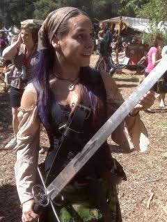 Super old pic, but this bad boi is a good head and a half taller than I am lol 

I love big weapons