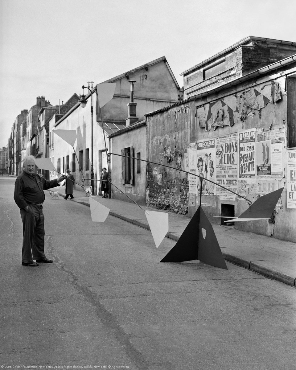 The pioneering French filmmaker and artist Agnès Varda met Calder in 1952, and the pair went on to become friends. Varda photographed Calder on many occasions during those years, capturing a range of indelible images. Read more: tinyurl.com/mr2223f2