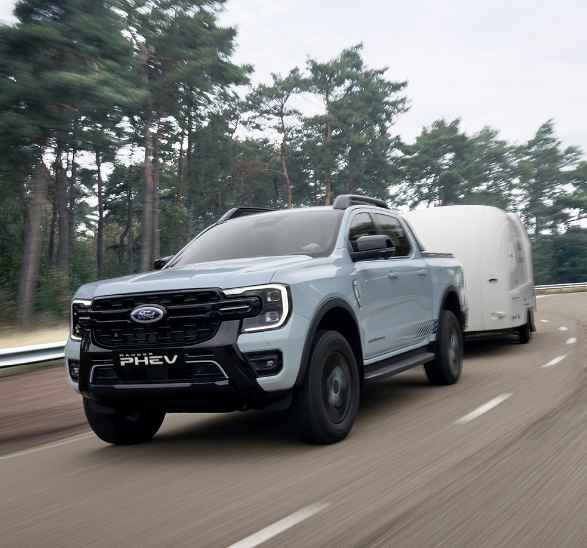 Gerald_Slaven's tweet photo. From work to play, the #Ranger #PHEV tows the line–capable of pulling up to 3,500kg. Talk to our teams in #belconnen and #phillip today about PHEV!!! https://t.co/GVoUxW1MLw