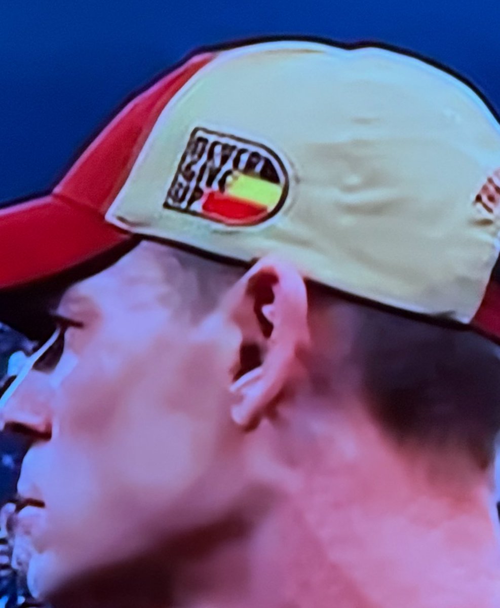 brk303's tweet photo. Just wondering if the WWE purposely messed with the Belgian flag on the hats? Or was it just the American educational system that decided it was okay to turn it 90 degrees?  #RawOnNetflix https://t.co/BQKqasAMn6