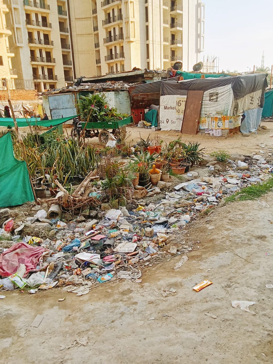 enquote_138's tweet photo. @CeoNoida @noida_authority @CPCB_OFFICIAL  please take action to get tons of garbage and human waste from the vacant plot between Aakriti Shantiniketan and Sikka Karnam Greens in Sector 143B, Noida https://t.co/TLBLi45uSH