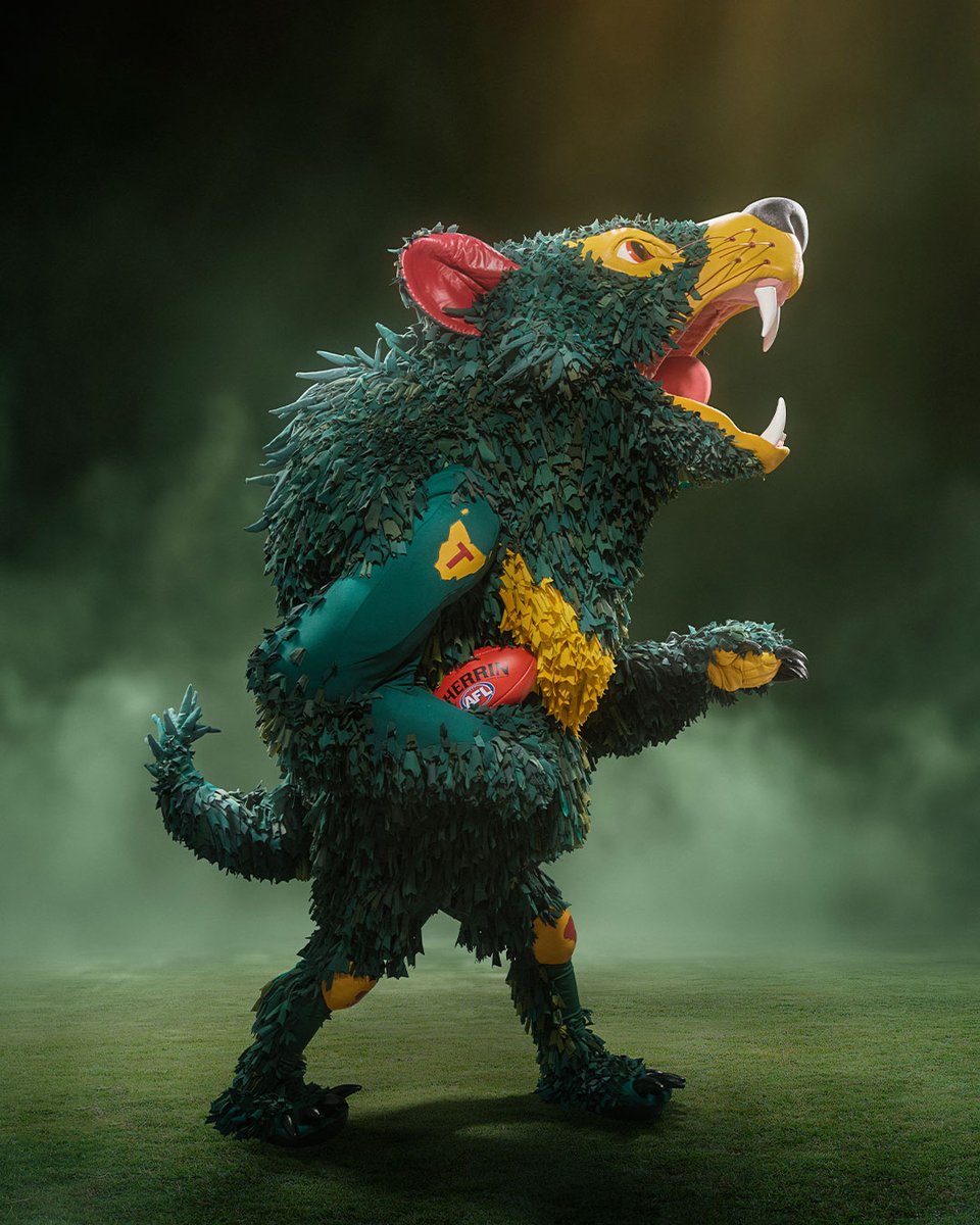 AFL's tweet photo. Introducing the Tasmania Devils new mascot, Rum’un 👋 @officialrumun https://t.co/psayE3dU0Z