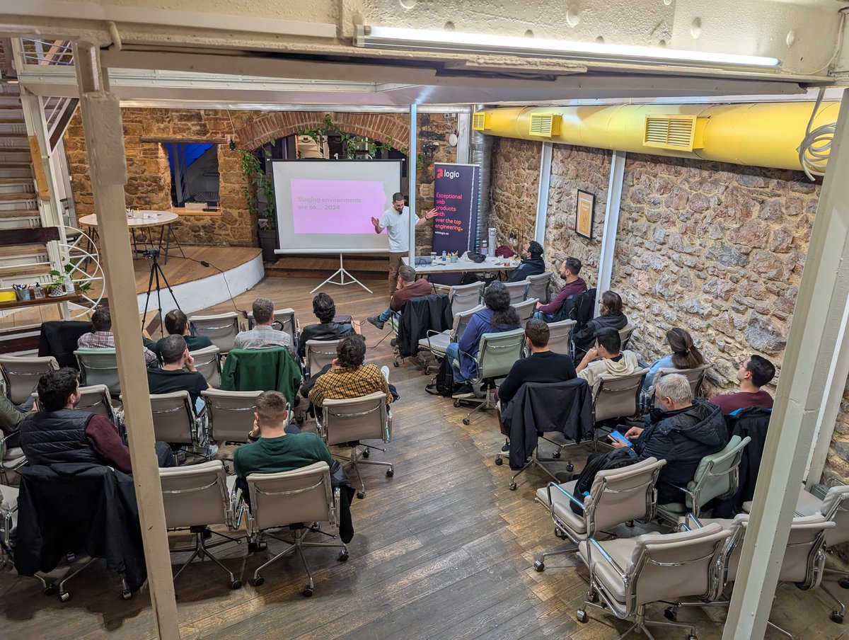 withlogicco's tweet photo. .@pariskasid is rocking the stage at #DockerAth talking about ephemeral preview environments and how we do stuff at LOGIC to make our day to day lovable! https://t.co/tW8ZuAZOZb