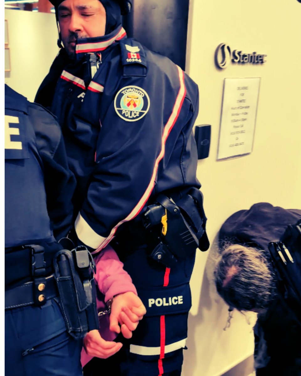 Cyclists lead by <a href="/Fridays4future/">Fridays For Future</a> went to <a href="/Stantec/">Stantec</a>'s office to ask why they're helping Ford destroy safe infrastructure. Instead of speaking w concerned citizens, Stantec employees called in Toronto Police who dragged out &amp; arrested two people for trespass to property. 1/2