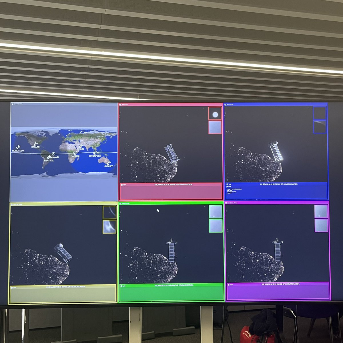Hushpreet's tweet photo. Have completed workshop on defending satellites from cyberattacks. Thanks to Nominal Systems https://t.co/dB5g7udtaI who set-up simulation: image shows satellites generating data feeds covering diff territories. Can see more of our defence work and demos at the AI Hub #AIUK https://t.co/nDYPRJwdPg