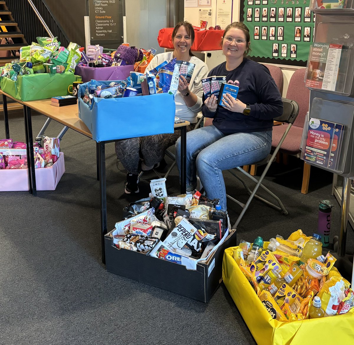 WoodheadPrimary's tweet photo. Look at our amazing rainbow hampers…. Remember to bring your change to buy a raffle ticket - £1 a strip! https://t.co/l4QynYFRhO