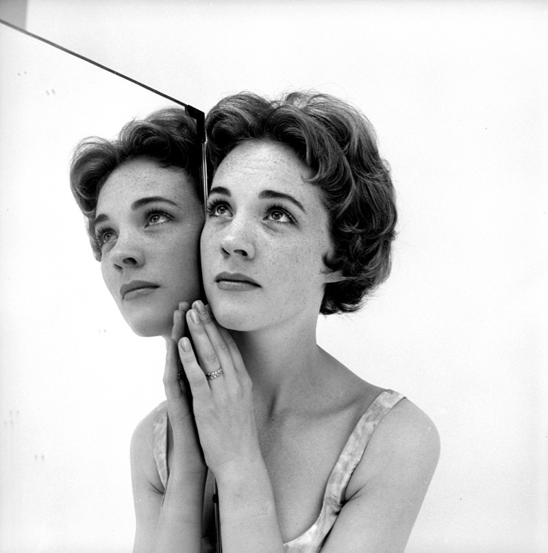 "Her clear, delicate complexion with pale freckles dotted about, is the first thing that strikes you about Julie Andrews. She uses so little make-up on her skin that from two or three feet away you'd think she wasn't wearing any at all."

Every Woman Magazine, May 1956