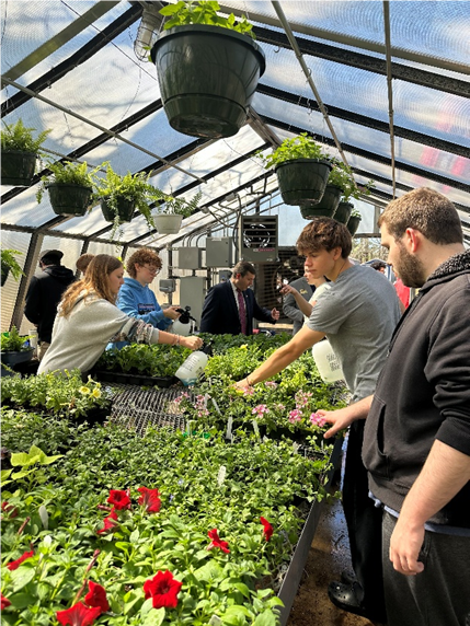 NCDOL's tweet photo. What a great way to celebrate National Ag Day! @NCDOL Commissioner Luke Farley visited students and faculty @millbrookmagnet Sustainable Agriculture Academy this afternoon.

Did you know that @millbrookmagnet started an agricultural education program in 1977. The program has grown over the past 48 years to include 3.5 teachers and pathways in Agricultural Mechanics, Animal Science, Horticulture and Sustainable Agriculture.

The program is also in its second year of an agriculturally focused Career Academy where students are able to earn industry credentials and gain hands-on experiences. One of the Agriculture teachers at Millbrook High School, Ryan Berglund, is currently serving as the Wake County Public Schools Teacher of the Year.

Thank you @PrincipalBrian, teachers, and students for a fun and informative afternoon!
#NationalAgricultureDay #WCPSS