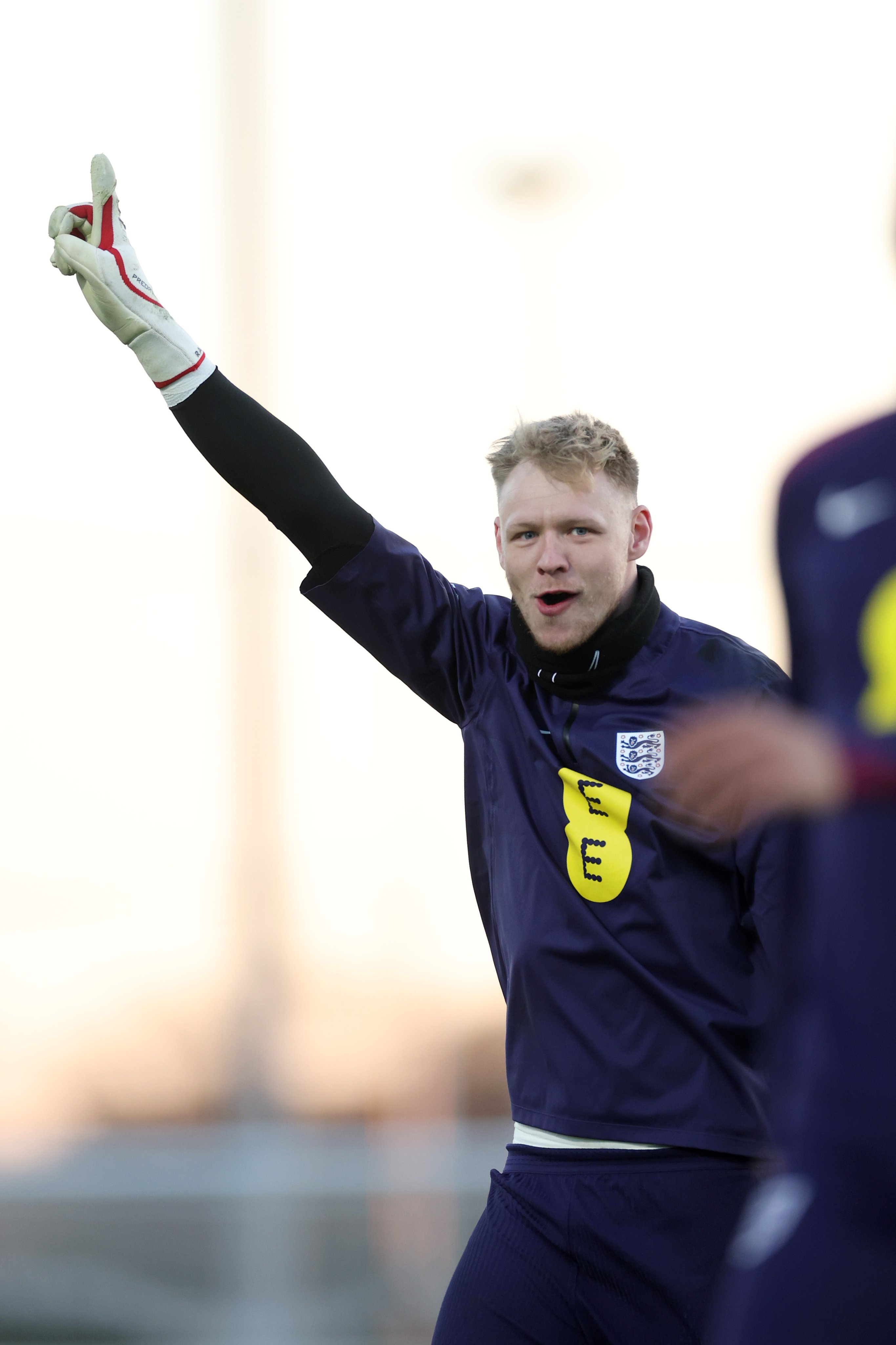 Aaron Ramsdale celebrates in training