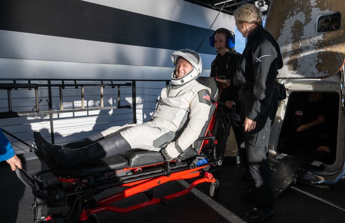 NASA astronaut Butch Wilmore is helped out of a SpaceX Dragon spacecraft onboard the SpaceX recovery ship Megan. Photo Credit: (NASA/Keegan Barber)