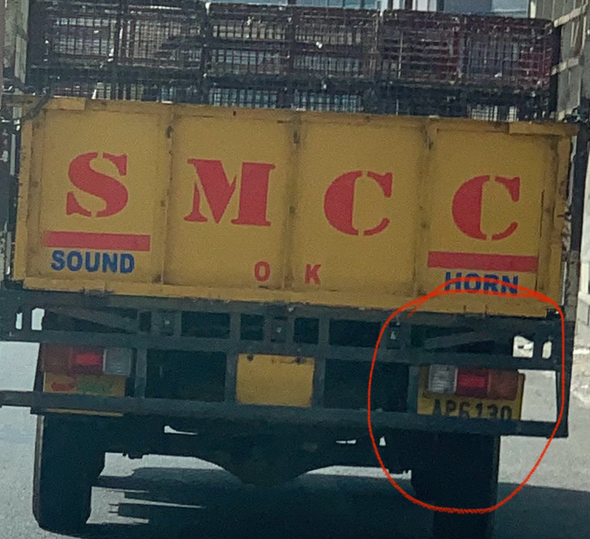 Dear <a href="/ecitytrfps/">ELECTRONIC CITY TRAFFIC BTP</a> <a href="/blrcitytraffic/">ಬೆಂಗಳೂರು ಸಂಚಾರ ಪೊಲೀಸ್ BengaluruTrafficPolice</a> 
Found this carrier in the Hosur Road near Veerasandra signal
As you can see, the registration plate is half covered
No cameras can register traffic violations for such cases
He sped so fast after signal that I could not see his front number plate