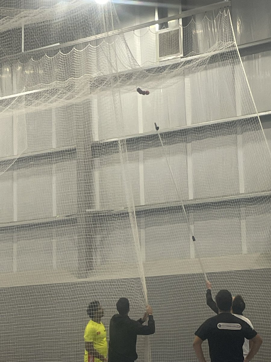 QUESTION…….

How many people does it take to get THREE cricket balls down from the top of the adult net??

ANSWER…….
One u16s, One Coach (who stuck the fourth ball up there), Four Adults and The Club President 😉

Well done Brian :)