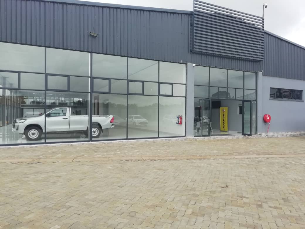Kumms_City's tweet photo. New project alert! Proudly crafted by KUMMS CITY, this stunning car sale showroom is a game-changer! Quality, style, and innovation come together in Harare! #ZimArchitecture #HarareBusiness #ZimBusiness #Innovation #MadeInZimbabwe #holyten #geza #qatar https://t.co/IffTepQgSo