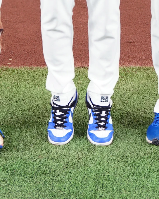 Close up shot of Yamamoto standing on his tippy toes.