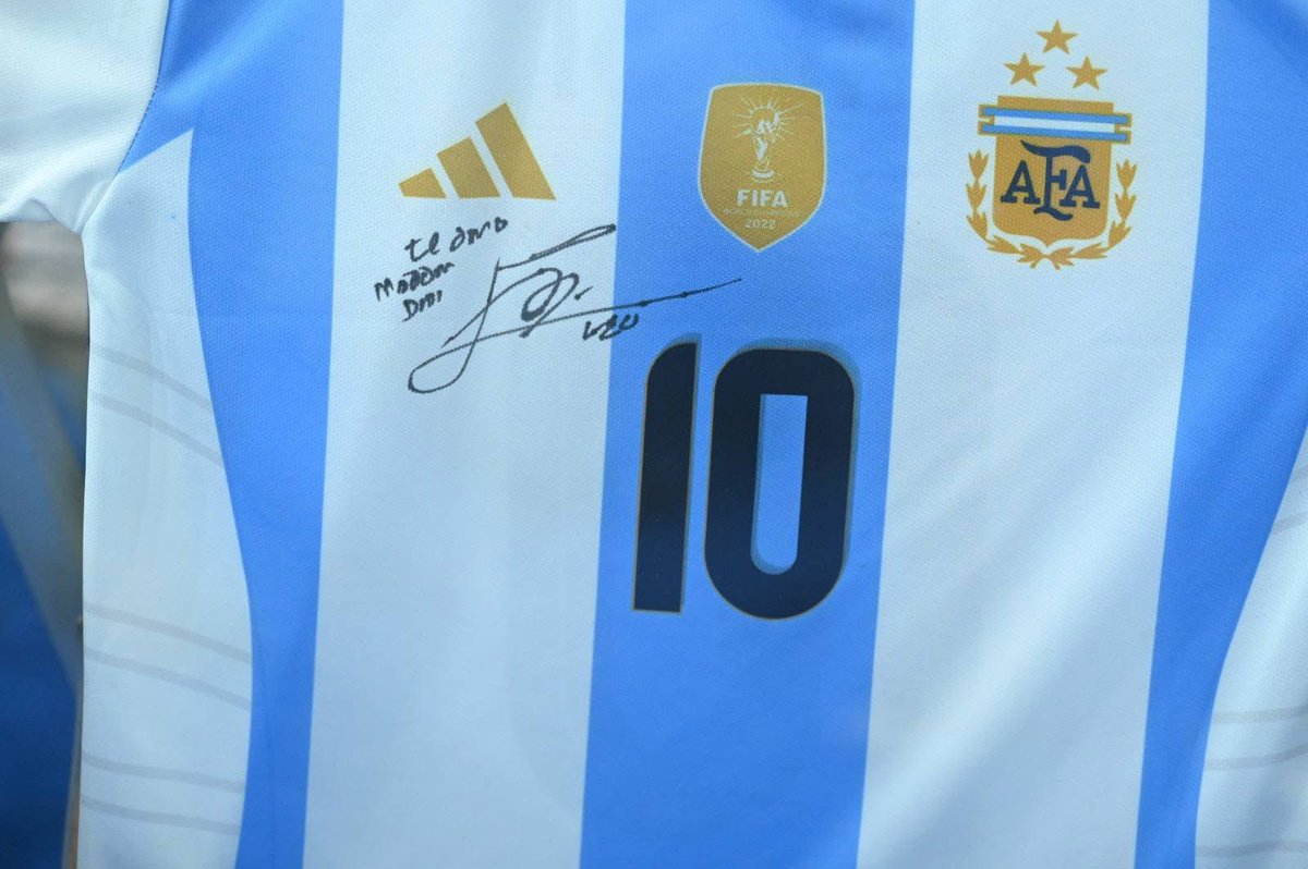 MamataOfficial's tweet photo. Football is a passion that runs through my veins, much like every person in Bengal who has ever kicked a ball on the 'para' fields. Today, that passion found a special place as I received a jersey signed by none other than Lionel Messi.  

The love for football binds us all, and Messi, an artist with the ball, a maestro of our times, embodies the spirit of brilliance that Bengal admires. This jersey is a symbol of the unbreakable connection between Bengal and the beautiful game.