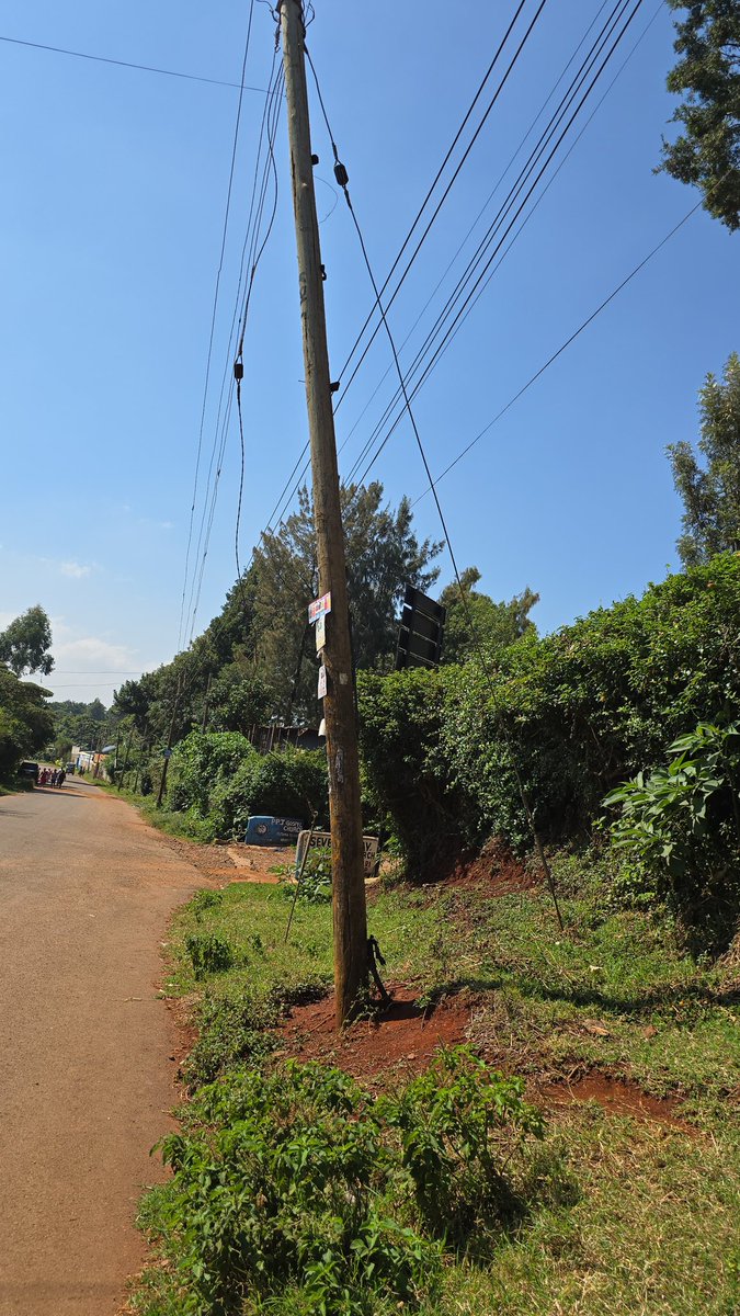JoeMbauni's tweet photo. @KenyaPower_Care 
The ramshackling @KenyaPower post as in below photos pose a great hazard/danger  to the households under the power lines in the event it collapses! With the rains pouring at the moment, you guys should replace the same asap to avert the disaster in the waiting! https://t.co/gO6WgYaLrM