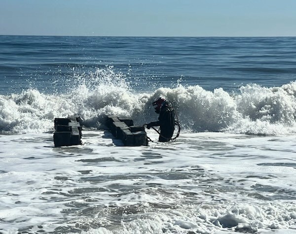 What did you do at work today? This gentleman with Eastern Marine Services is conducting a scheduled (every 4 years), routine inspection of the city's stormwater outfalls.