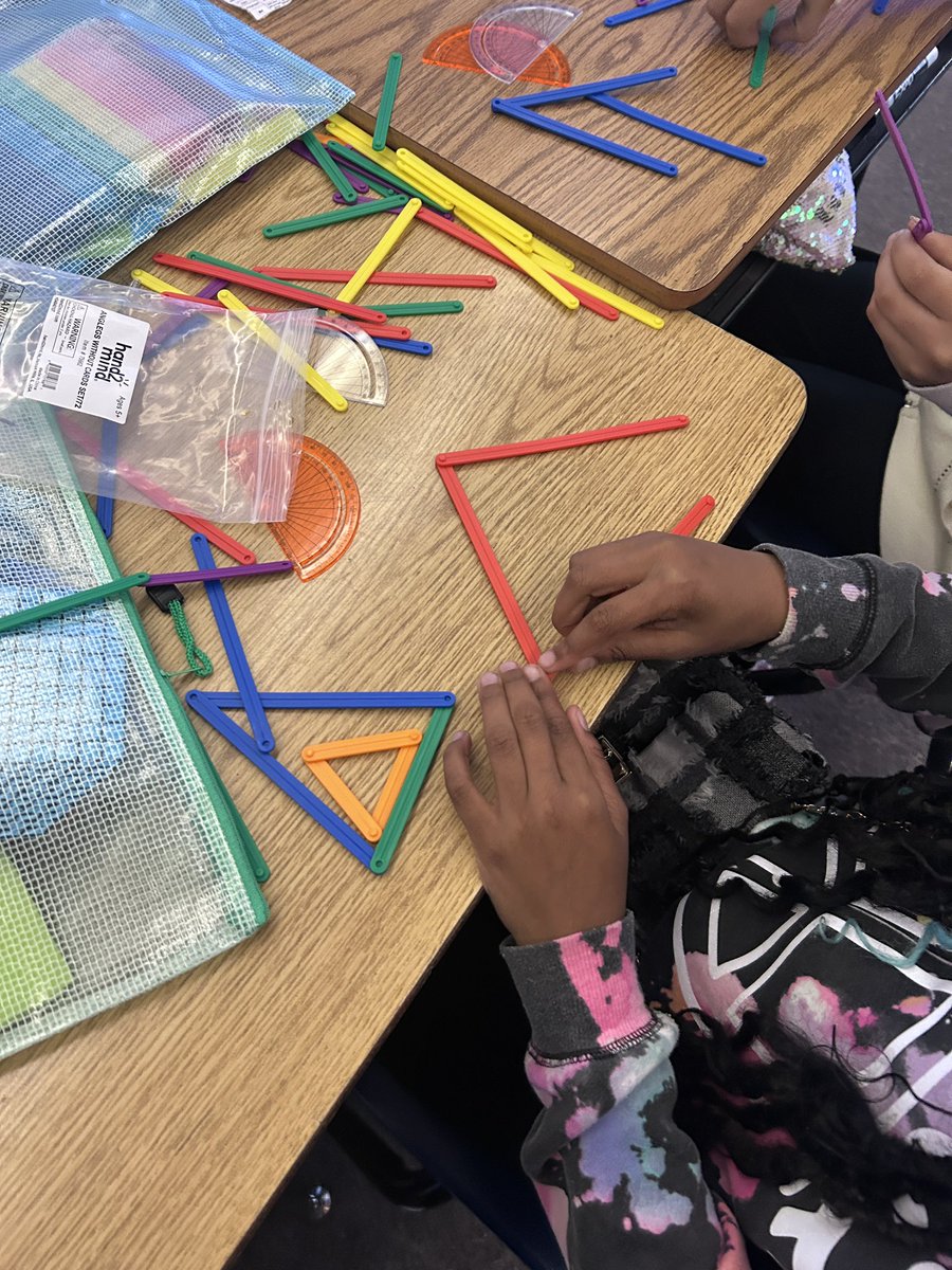 Today students were practicing making triangles and quadrilaterals using their anglegs manipulatives!