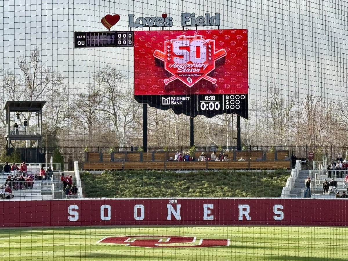 DevinNewsom's tweet photo. Players representing all 5 decades of @OU_Softball are on the field for first pitch! How cool is that!? #50th @OU_Softball 🔥🥎 #BoomerSooner https://t.co/bnSon6pTEw