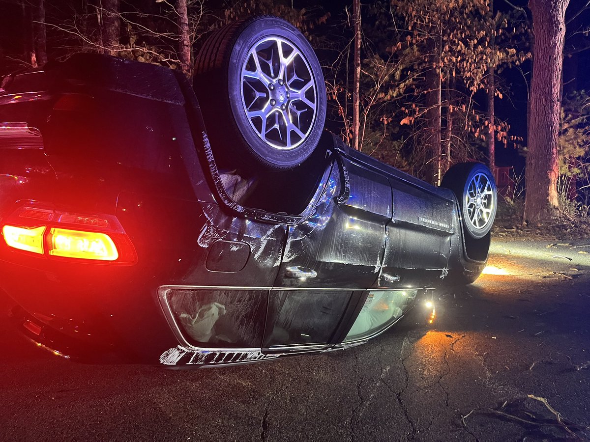A2 and Engine 2 working a rollover on Saddle Hill.