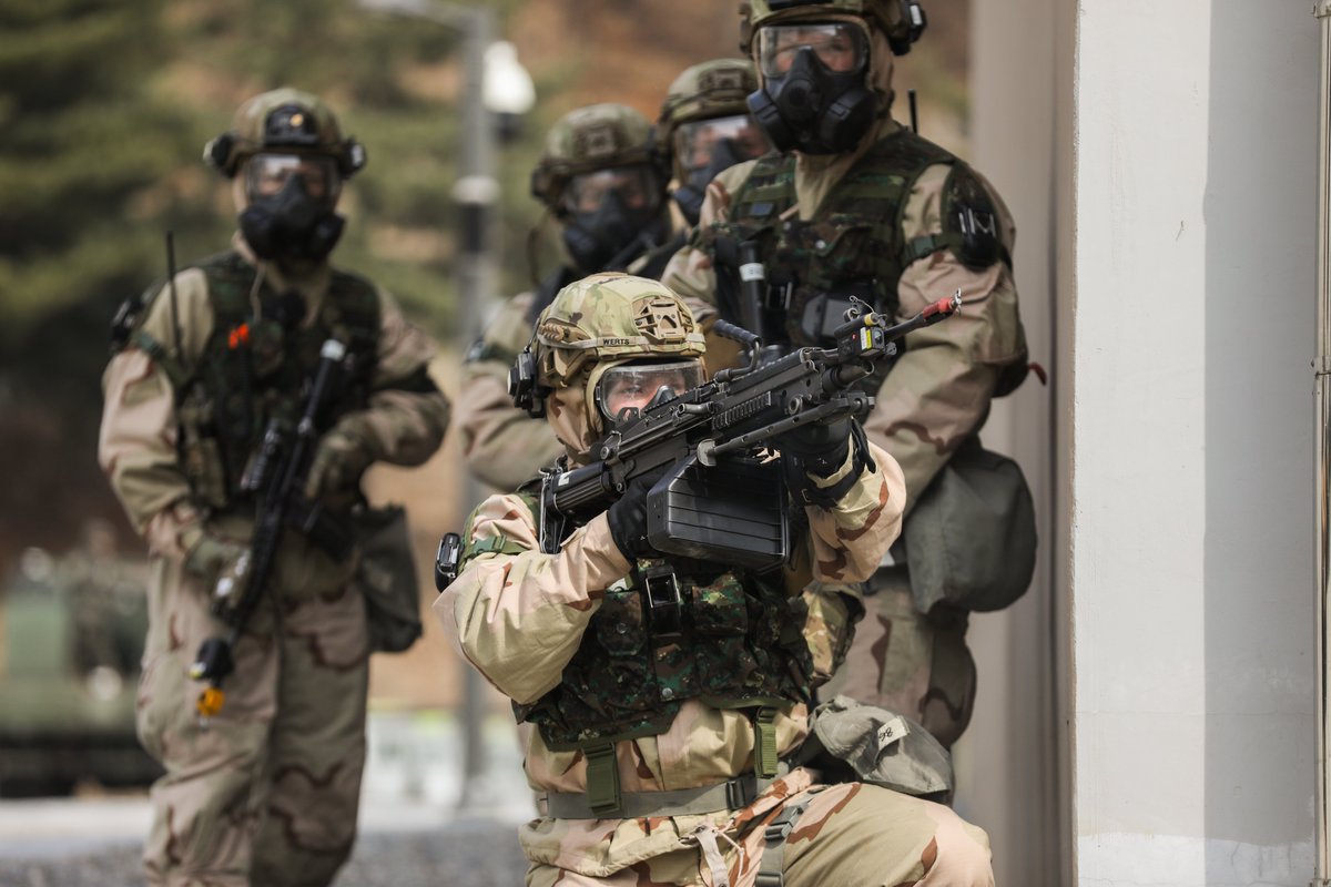 EighthArmyKorea's tweet photo. Soldiers of 1-2 Stryker Bde Combat Team, conduct an urban assault during exercise #FreedomShield25 March 17, in South Korea. The joint, multi-domain training focuses on enhancing combat readiness in a combined, interagency environment. Pacific Victors! (📸Sgt. Oniel McDonald) https://t.co/W4qDvXhYHO