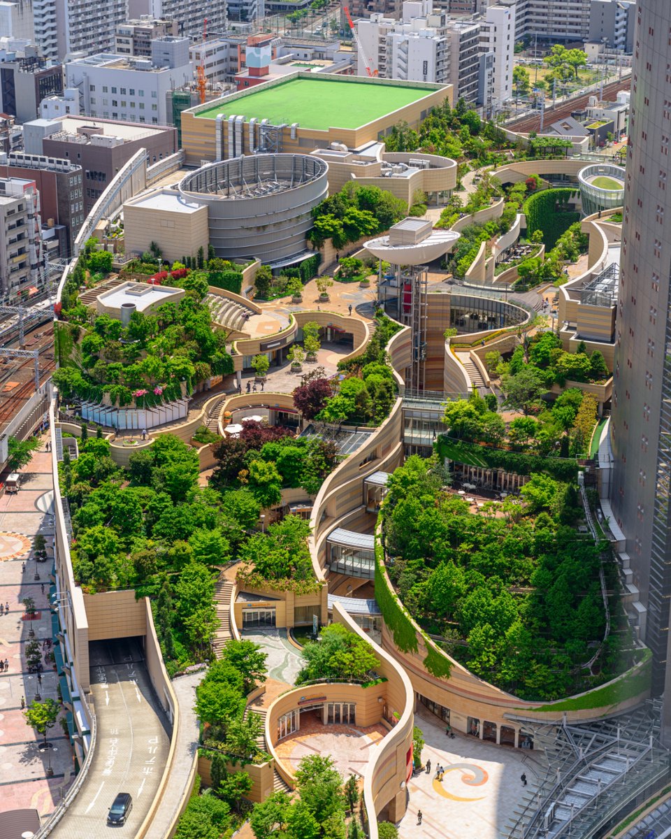 We know how to build cities that don't cost the Earth:

✅ Nature-Based Solutions (green roofs, wetlands)
✅ Urban Green Spaces (parks, tree canopies)
✅ Sustainable Transport (bike lanes, e-mobility)
✅ Smart Planning &amp; Community Action

Photo: Namba Parks, Osaka, Japan