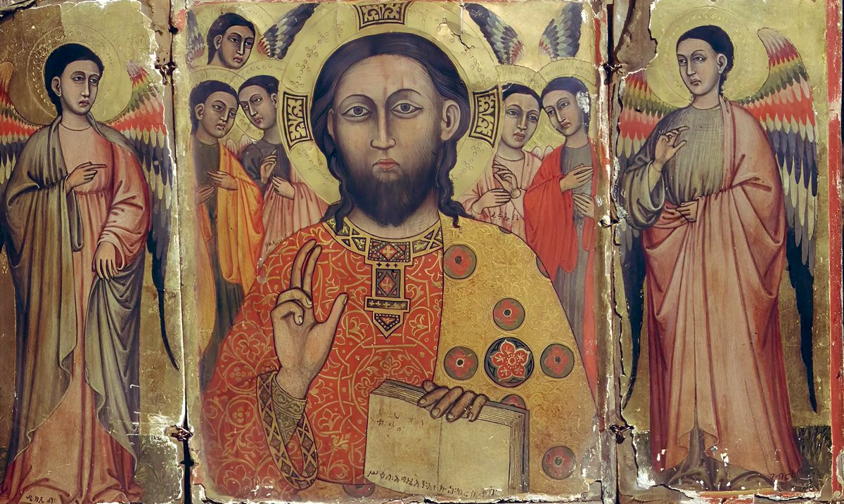 Abyssinia_Vault's tweet photo. The 14th-century Byzantine-style triptych, which belongs to the Church of the Saviour of the World (መድሀኒአለም), near the 982 BCE Tadbaba Maryam Monastery in Wollo, Ethiopia, shows Christ blessing with his right hand while holding a Gospel, flanked by archangels. #Orthodox https://t.co/nRKJwAD4YM