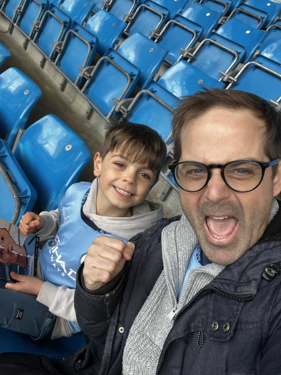 theryanbott's tweet photo. @poss_Abilities This makes me smile. Me and my son watching @ManCity https://t.co/68CJBqPwbc