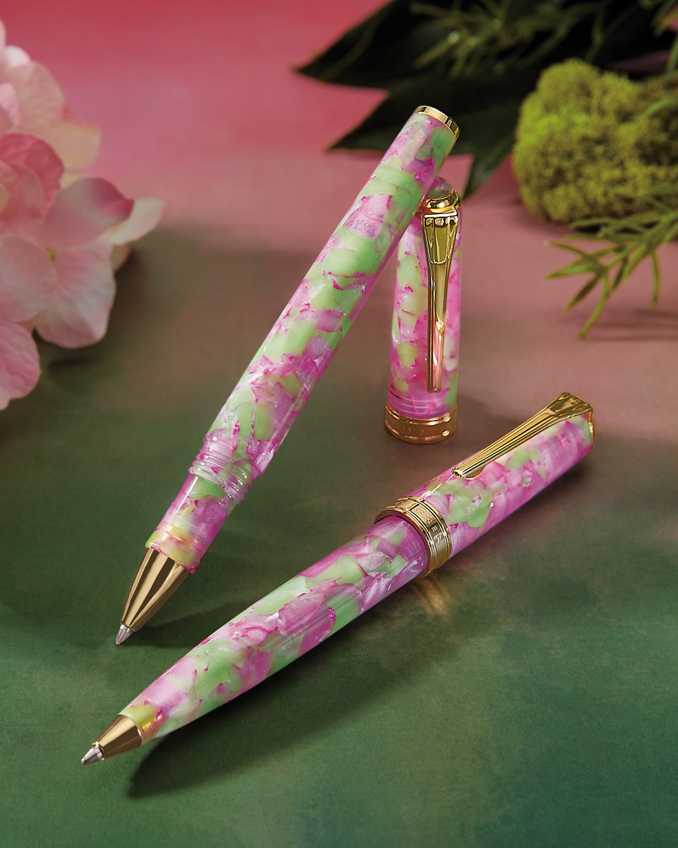 Levenger's tweet image. Spring has arrived at last, and it's time to bloom. Presenting the True Writer Classic Lucina, our ode to spring in hand-turned pink and green resin highlighted by gleaming 24k gold-plated trim and appointments.

#SpringHasArrived #TrueWriterClassic
#Pen #Spring #PenCollectors