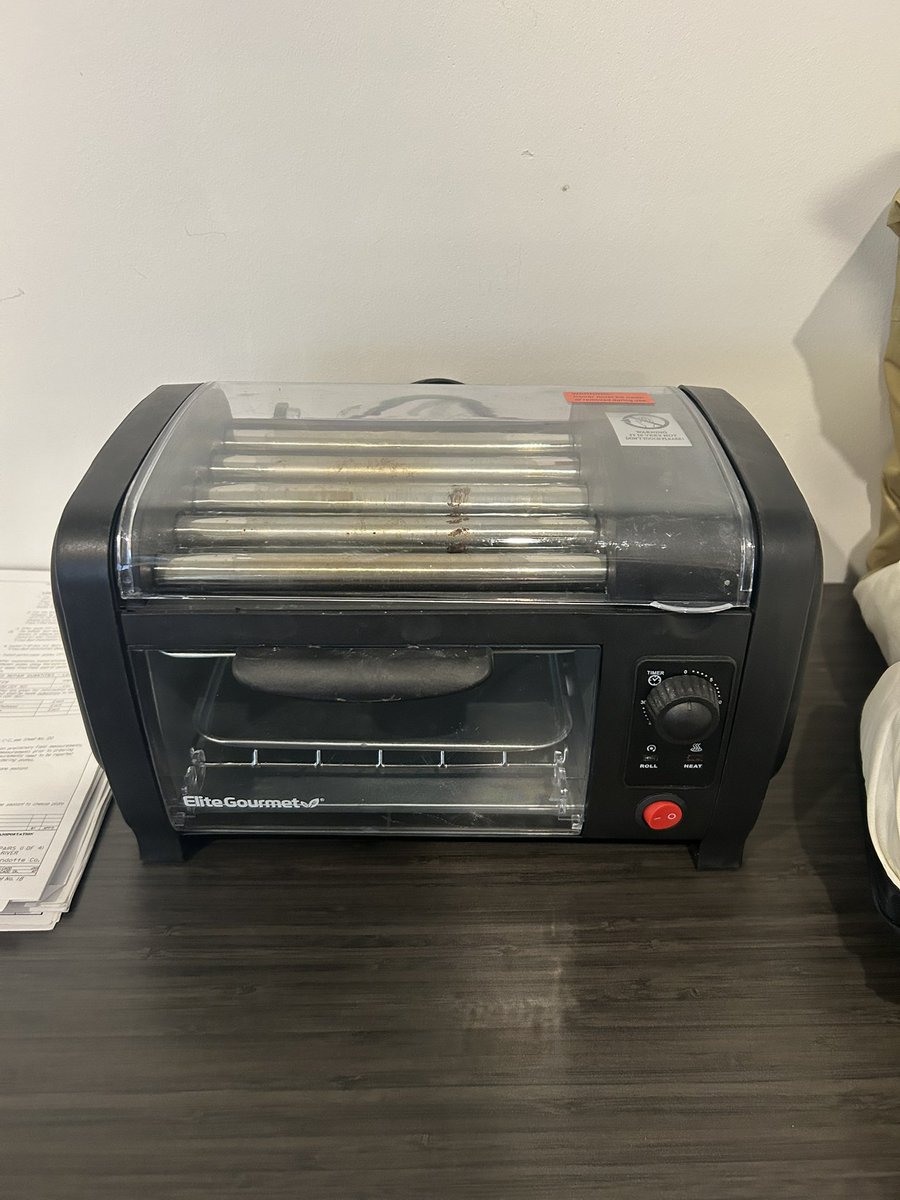 DrHustle94's tweet photo. They gave me an office. The countertop dog roller is back in action!!! https://t.co/gEfWtuPCDH