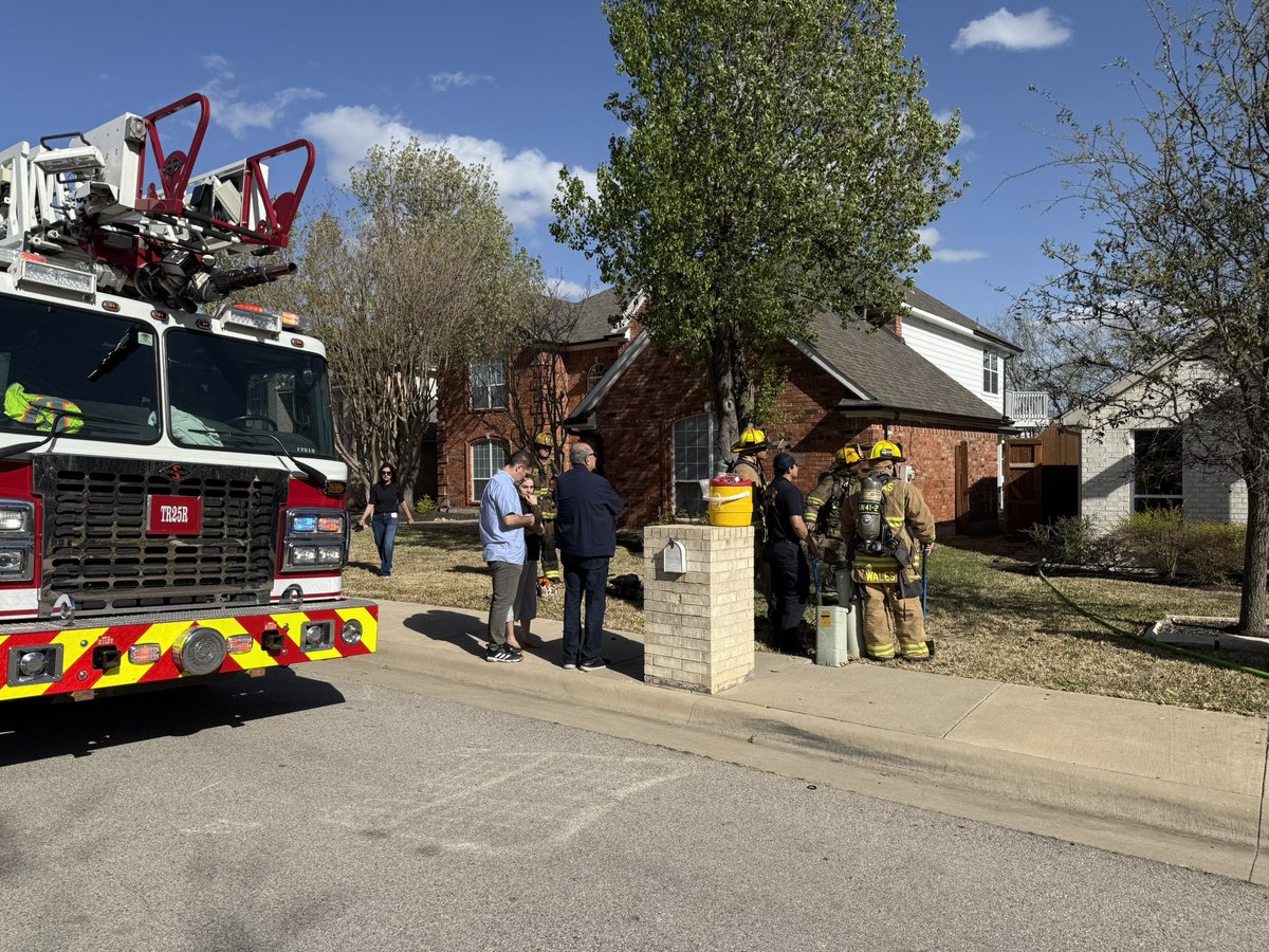 As we were clearing up at the brush fire, a 2nd alarm was transmitted for a house fire in far north Dallas at 17620 Squaw Valley. High winds spread the fire in the original home to the houses on either side.