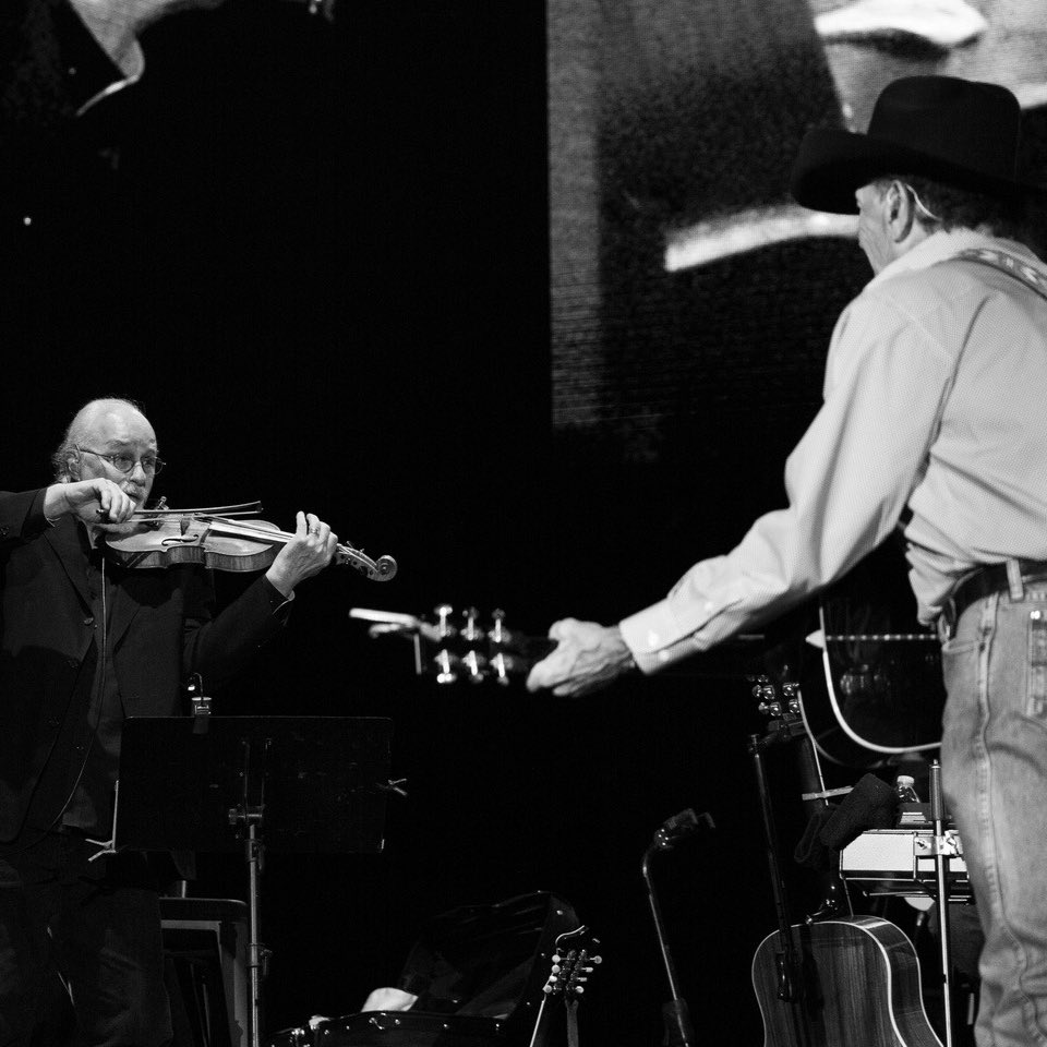 GeorgeStrait's tweet photo. One year ago today, our music family lost two beloved members on the same day. We honor the memory of Gene Elders, a beloved member of Ace in the Hole, and Erv Woolsey, our dedicated manager and friend. Though they are deeply missed, their legacy and influence continue to live on in our hearts.