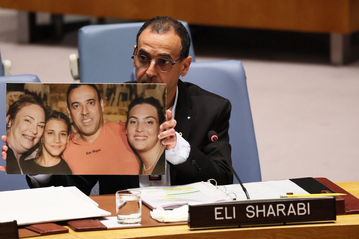 HenMazzig's tweet photo. “Hamas eats like kings, while hostages starve.”

Hamas survivor Eli Sharabi addresses the UN Security Council:

“I know you discuss the humanitarian situation in Gaza very often, but let me tell you as an eyewitness, I saw what happened to that aid: Hamas stole it.”

“I saw Hamas terrorists carrying boxes with the UN and UNRWA emblems on them into the tunnels, dozens and dozens of boxes, paid for by your government.”

Will the world listen now?