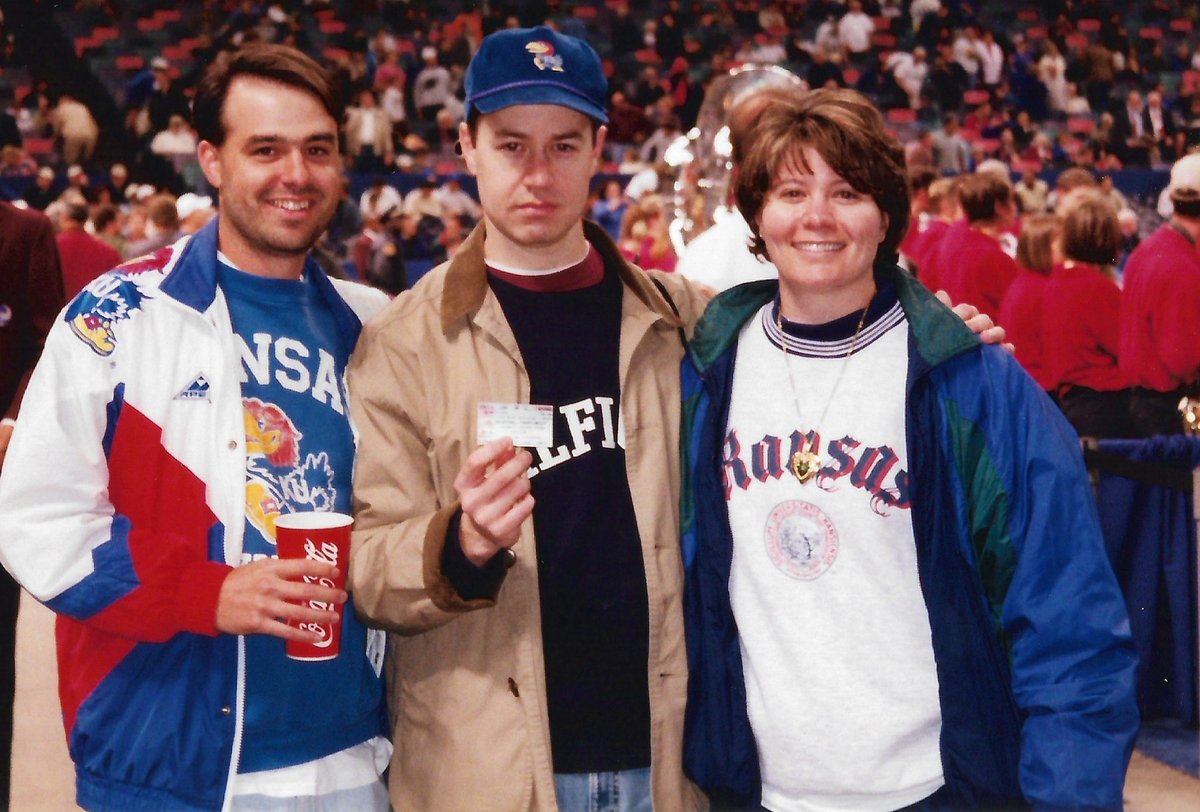 BHanni's tweet photo. Today’s #KUCancerFighter dedication celebrates the life of 1995 KU graduate, John Bowman, who passed away earlier this month after a 2.5 year battle with Glioblastoma brain cancer.

John was just 51 when he passed but lived his life to the fullest, growing up in Salina, KS where he attended Salina South. He then followed his brother Aaron to KU where he excelled in the School of Engineering and loved watching his Jayhawks in The Phog, especially his all-time favorite ‘Hawk - Jacque Vaughn. 

After graduation, John went on to become a very successful petrochemical engineer for more than 25 years, mostly in Baton Rouge. He raised 3 kids - a daughter, Natalie and two sons, Drew & Jack. Being down on the Bayou, John got to host his Kansas buddies for the Final Fours in 2003, 2012 and 2022 — some of the happiest memories of their lives. Those same friends are watching the Big Dance with heavy hearts this month but are reflecting fondly on the great times they got to share with their buddy John, especially over Kansas Basketball.

Tonight’s call is for John, his family and that KU Hoops friend group he cherished so much. Rock Chalk forever, John. 💙❤️