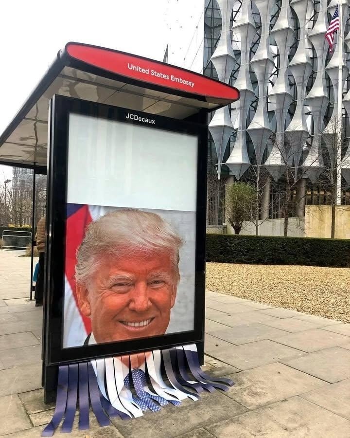 Bus stop outside the American embassy in London 🤣🔥