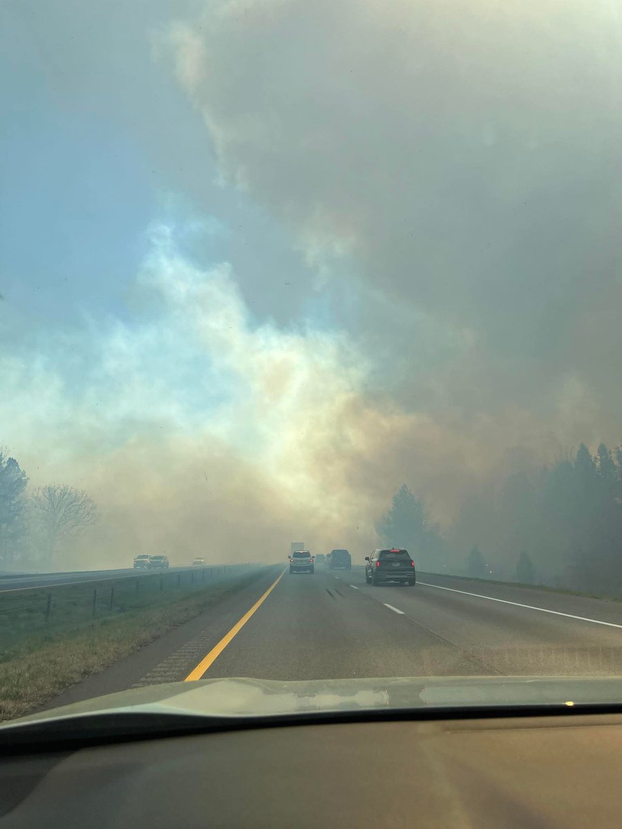 CodyAlcorn's tweet image. Another picture and video from I 26 in Spartanburg County, South Carolina showing a large brush fire that’s closed the interstate