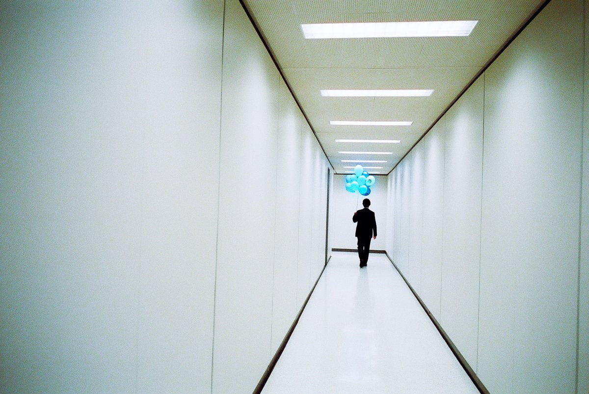 Finale Day. 

film still #66 
Adam with balloons. 
#severance