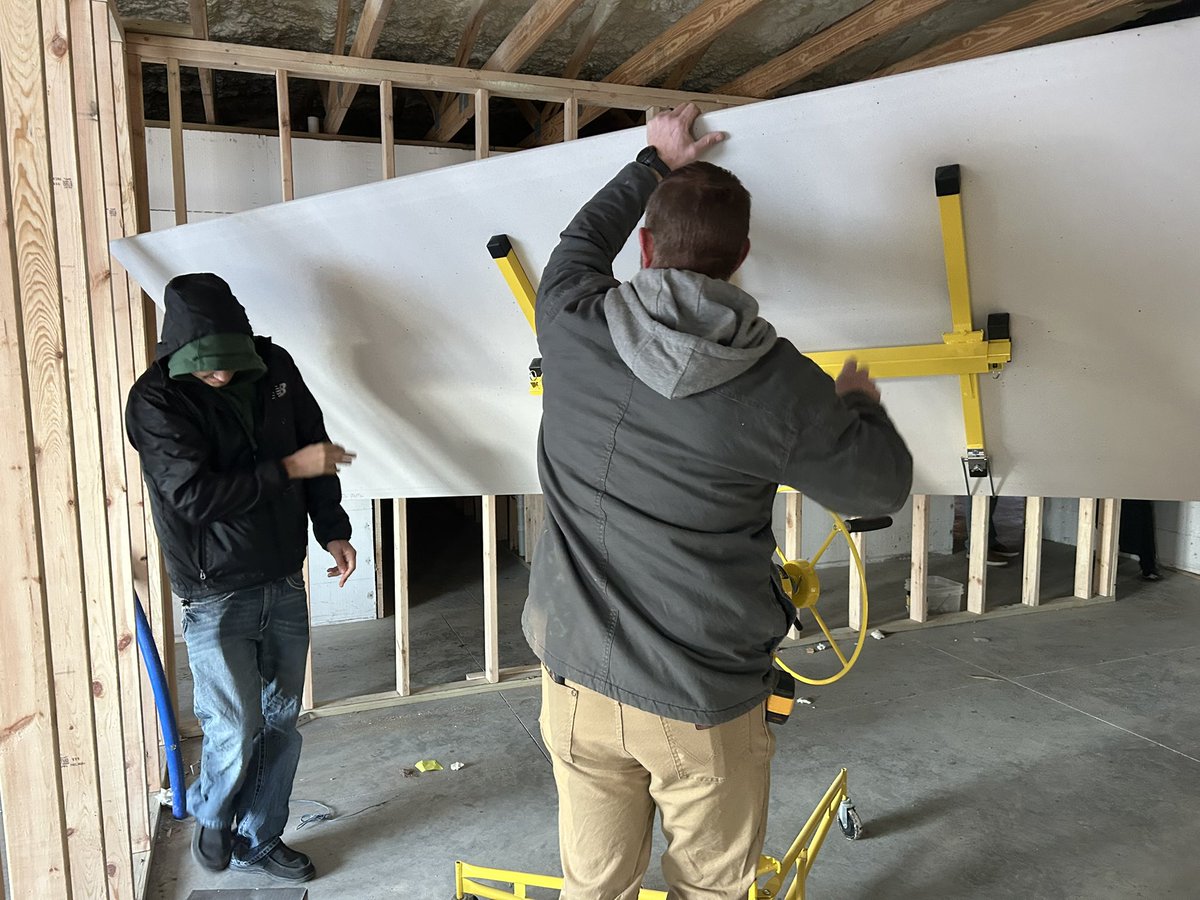 PrinciplClausen's tweet photo. I stopped by Mr. Benson’s Construction 2 class.  They were hanging drywall in our SSC Activities Concession Stand.  Real career pathway experiences in our Construction and Engineering Academy.  @SSCActivities https://t.co/lNp0a492H3