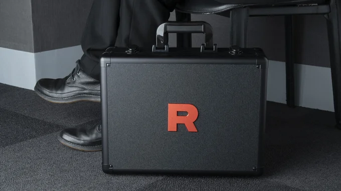 PokemonDealsTCG's tweet photo. The Glory of Team Rocket Merchandise Also Revealed, Including a Team Rocket Briefcase!🚀

#Pokemon #PokemonTCG https://t.co/ga3TNeqR34