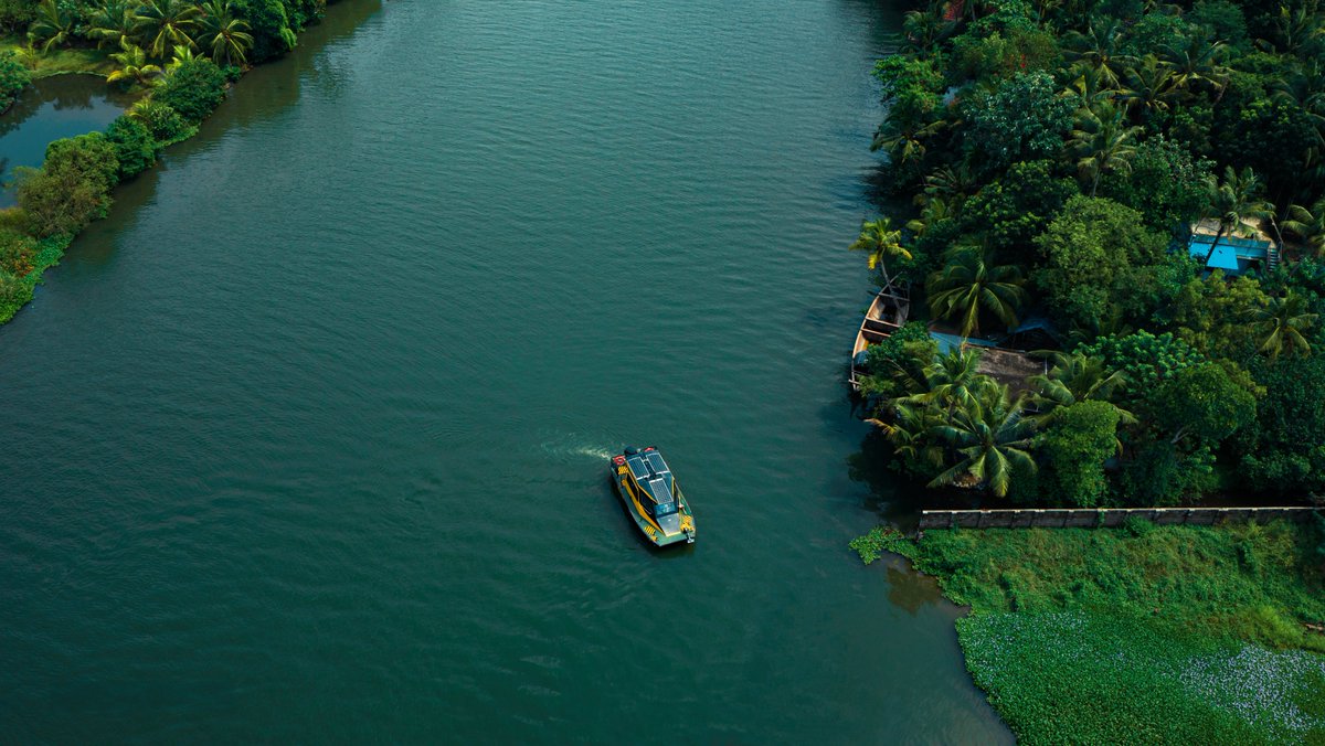 NavaltBoats's tweet photo. Lush greenery surrounds the clear, green-tinged waters, where a cheerful yellow boat adds a touch of charm.

#Nirva #Navalt #Kerala #keralatouirsm #nature https://t.co/GajsFN6jLq