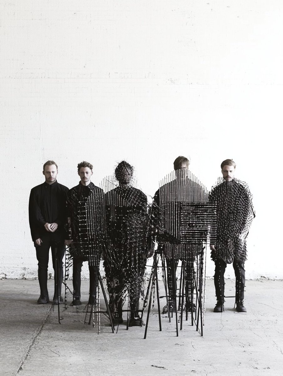 Unleash the Sound Revolution 🎶

Step into the world where music meets art. A band of avant-garde musicians in eclectic urban attire, set against the haunting backdrop of an abandoned warehouse. 🎷

Prompt 👇  
photo of a group of avant-garde musicians, standing, wearing eclectic