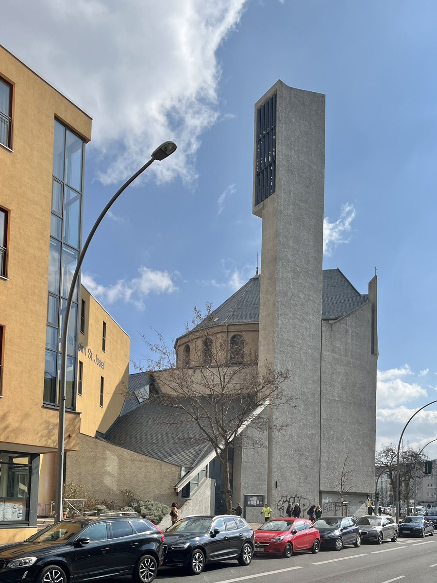 stoneroberts's tweet image. St Norbert Catholic Church, Berlin Schöneberg. Original church 1916, bombed WWll. Preserved and incorporated into new church Fehling & Gogel architects 1958-62. Interior is modified remnant wrapped in a new tower, sculptural wall and ancillary block.