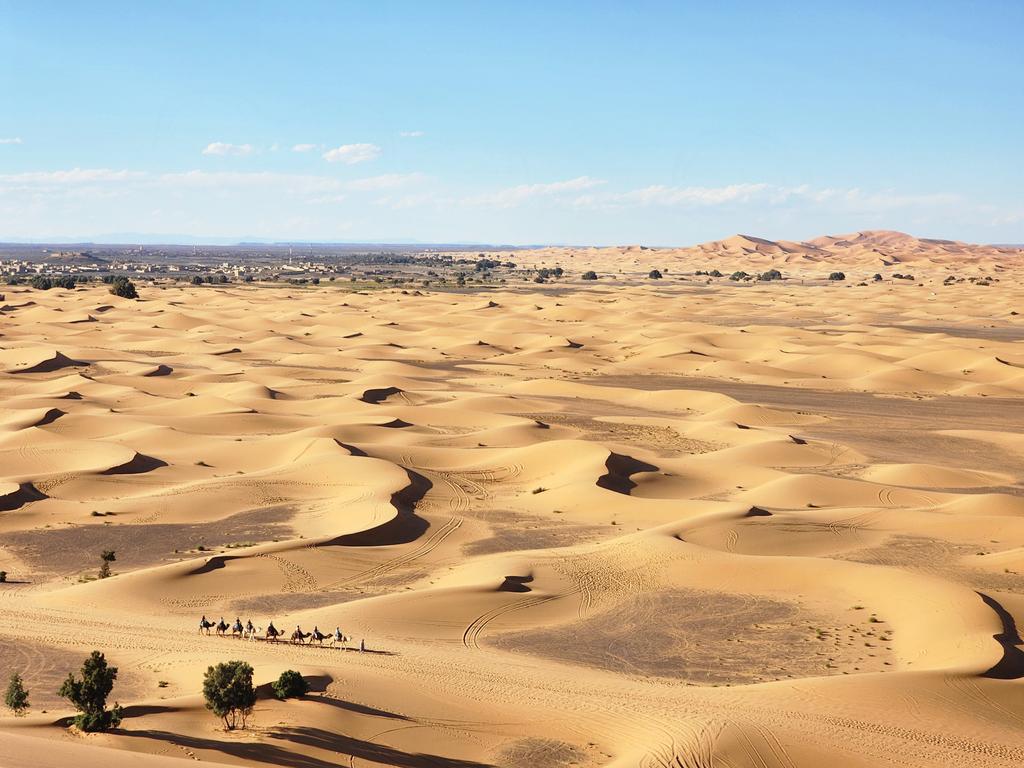 Merzouga is a small Moroccan town in the Sahara Desert, near the Algerian border. It’s known as a gateway to Erg Chebbi, a huge expanse of sand dunes north of town. West of Merzouga, Dayet #historyMoroccoTours #privateitineraries #moroccodeser